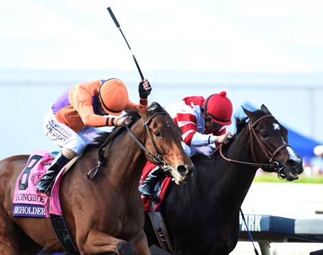 Gary Stevens guides Beholder, left duels to the finish with Mike Smith on Songbird to the win in the Breeders' Cup Distaff at Santa Anita Nov. 4, 2016 in Arcadia, California. Gary Stevens guides Beholder, left duels to the finish with Mike Smith on Songbird to the win in the Breeders' Cup Distaff at Santa Anita Nov. 4, 2016 in Arcadia, California.
