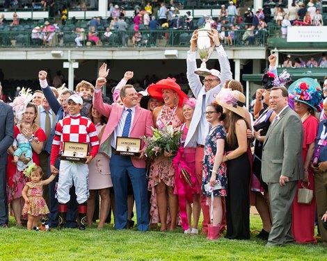 Trainer Tom Amoss, arm up pink jacket, and owner Joel Politi holding trophy. Serengeti Empress with Jose Ortiz wins the Kentucky Oaks (G1) at Churchill Downs during Derby week 2019 May 3, 2019 in Louisville, Ky. Trainer Tom Amoss, arm up pink jacket, and owner Joel Politi holding trophy. Serengeti Empress with Jose Ortiz wins the Kentucky Oaks (G1) at Churchill Downs during Derby week 2019 May 3, 2019 in Louisville, Ky.