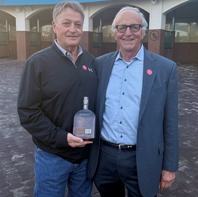 Trainer Greg Foley (left) and owner Fred Schwartz with a Bango-branded Woodford Reserve Bottle at the retirement ceremony of Churchill Downs' all-time winningest horse. Trainer Greg Foley (left) and owner Fred Schwartz with a Bango-branded Woodford Reserve Bottle at the retirement ceremony of Churchill Downs' all-time winningest horse.