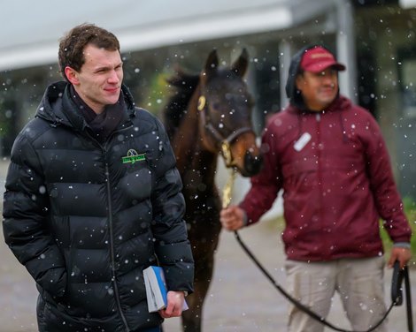 Jes Sikura with Hill 'n' Dale Farm at Xalapa looking at a yearling during the sale as a winter squall came through and another yearling waited to be shown behind him. Keeneland January Horses of All Ages Sale at Keeneland near Lexington, Ky., on Jan. 11, 2026. Jes Sikura with Hill 'n' Dale Farm at Xalapa looking at a yearling during the sale as a winter squall came through and another yearling waited to be shown behind him. Keeneland January Horses of All Ages Sale at Keeneland near Lexington, Ky., on Jan. 11, 2026.