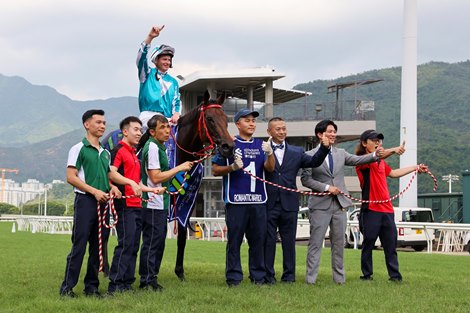 Connections of Romantic Warrior celebrate their success after the Group 1 feature Connections of Romantic Warrior celebrate their success after the Group 1 feature