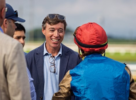 Wathnan Racing manager, Case Clay, speaks with jockey Irad Ortiz, Jr. after he won the Indiana Derby aboard Leading Change. Wathnan Racing manager, Case Clay, speaks with jockey Irad Ortiz, Jr. after he won the Indiana Derby aboard Leading Change.