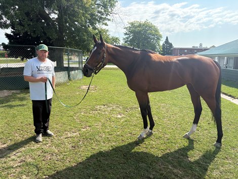 Trainer Dale Desruisseaux with 2025 Marine Stakes (G3) winner Dixie Law at Woodbine Trainer Dale Desruisseaux with 2025 Marine Stakes (G3) winner Dixie Law at Woodbine