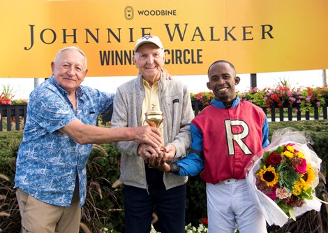 Jockey Jalon Samuel guides Fire and Wine to victory in the $400,000 Breeders's Stakes, the final leg of the Canadian Triple Crown, for owner Paul Ryder and trainer Zeljko Krcmar. Woodbine/Michael Burns Photo Jockey Jalon Samuel guides Fire and Wine to victory in the $400,000 Breeders's Stakes, the final leg of the Canadian Triple Crown, for owner Paul Ryder and trainer Zeljko Krcmar. Woodbine/Michael Burns Photo