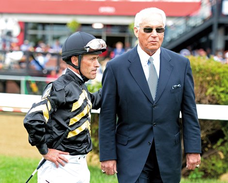 Caption:  No smiles beforehand, all business are Gary Stevens and trainer D. Wayne Lukas.   Oxbow with Gary Stevens wins the Preakness (gr. I) Preakness week 2013 with Preakness horses and other going to the track at Pimlico on May 18, 2013, in Baltimore, Md. PREAKNESS R12 Preakness  image120 Photo by Anne M. Eberhardt