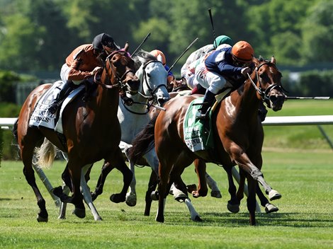 Coffee Clique brews up a victory in the Grade I Just a Game Stakes at Belmont Park.