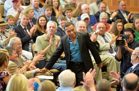 Hall of Fame jockey Angel Cordero Jr. is introduced to the crowd at the Thoroughbred Race Hall of Fame ceremony held at the Fasig-Tipton Sales Pavilion Aug. 8, 2014 in Saratoga Springs, N.Y.   Photo by Skip Dickstein