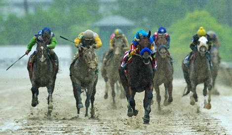 American Pharoah charges towards the finish line in the 140th running of the Preakness Stakes.
