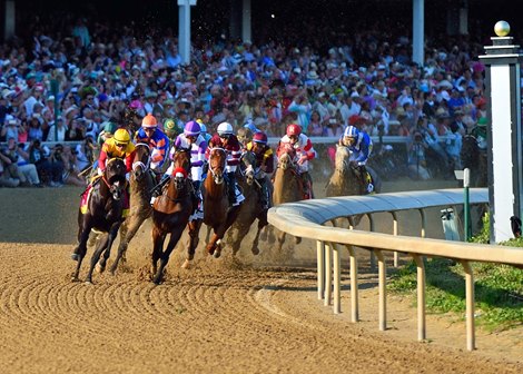 Nyquist and Danzing Candy dueling into the first turn of the 142nd Kentucky Derby