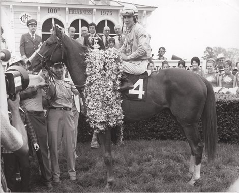 Golden Chance Farm's Master Derby poses with jockey Darrell McHargue after winning the 100th Preakness Stakes at Pimlico Race Course May 17, 1975