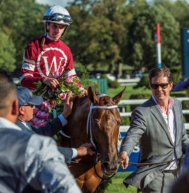 Owner Ron Winchell leads his horse Gun Runner and jockey Forent Geroux to the winner&#39;s circle after he won the 90th running of The Whitney Stakes at the Saratoga Race Course  Saturday Aug. 5, 2017 in Saratoga Springs, N.Y.  <br><br />
