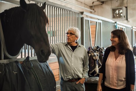 Columbia University researchers Dr. Yuval Neria (L) and Dr. Prudence Fisher at the Bergen Equestrian Center, which is conducting clinical trials on equine therapy for veterans with PTSD.