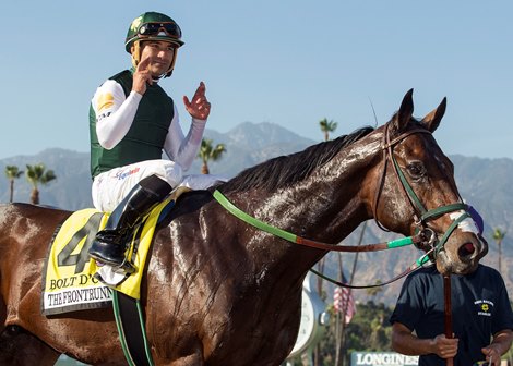 Jockey Corey Nakatani celebrates aboard Bolt d&#39;oro as they enter the winner&#39;s circle following their victory in the G1, $300,000 FrontRunner Stakes, Saturday, September 30, 2017 at Santa Anita Park, Arcadia CA.