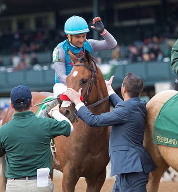 David Meah greets Corey Nakatani after Gas Station Sushi with Corey Nakatani wins the Beaumont (G3) at Keeneland on April 8, 2018 Keeneland in Lexington, Ky. 