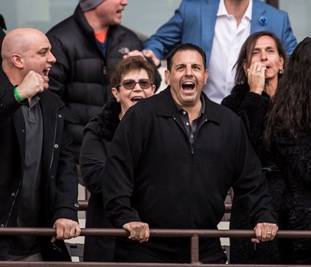 Owner Mike Repole, center cheers on Vino Rosso with jockey John Velazquez wins the 94th running of The Wood Memorial at Aqueduct Saturday April 7, 2018 in Ozone Park, N.Y. 