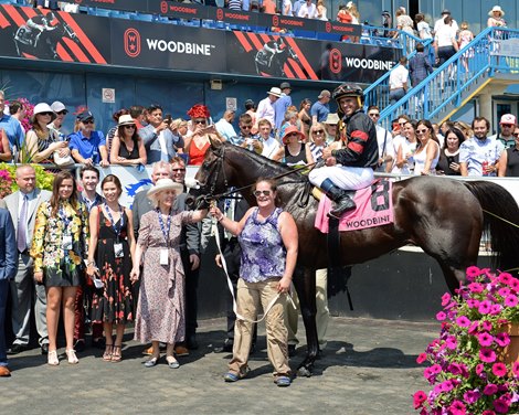 Frieda Stronach in hat, owner with Stronach Stables. Delta Prince with Javier Castellano wins the King Edward (G2T)<br><br />
Morning horse scenes at Woodbine Racetrack  June 30, 2018 Woodbine in Toronto, Ontario. 