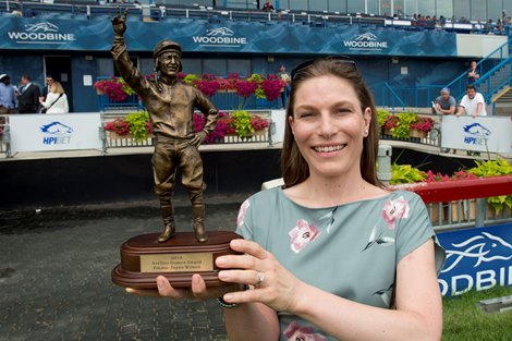 Jockey Emma Jayne Wilson receives the Avelino Gomez award for outstanding jockey contribution Saturday, June 9, 2018 at Woodbine Racetrack. Toronto, Ontario.