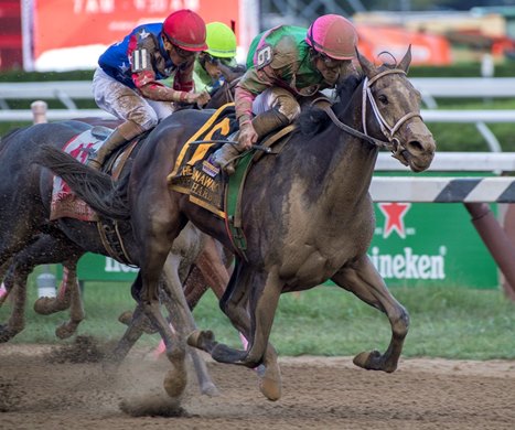 Sippican Harbor wins the Spinaway Stakes at Saratoga Saturday, September 1, 2018.