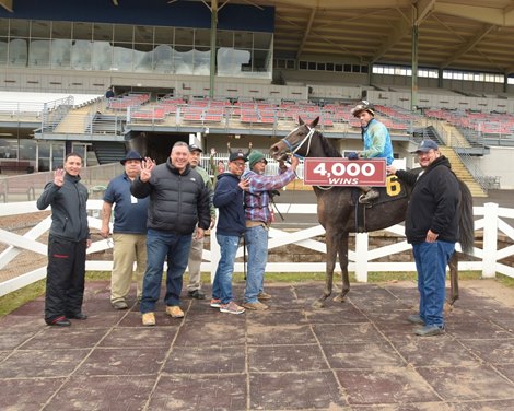 Jockey John Davila Jr. celebrates career victory 4,000 in the Finger Lakes winner&#39;s circle Oct. 29