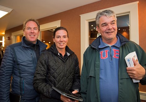 l-r,  Todd and Catherine Day Phillips and Sean Fitzhenry. Hip 859 colt by Bodemeister for Loving Vindication and Anderson Farms  Oct. 24, 2018 Fasig-Tipton in Lexington, Ky.