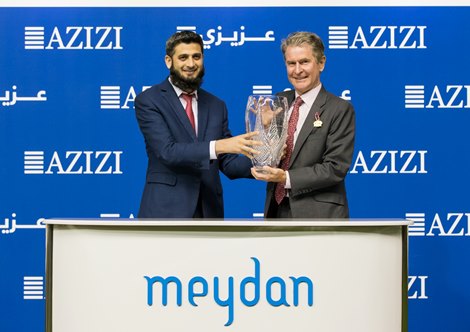Hugh Anderson accepting Afzaal Khan's 2019 Saint Riviera Handicap trophy on January 17, 2019