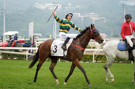 Hugh Bowman celebrates his second BMW Hong Kong Derby win.