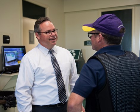 with trainer Brendan Walsh in racing secretary office. Ben Huffman, left,  at Keeneland on April 18, 2019 in Lexington,  Ky.