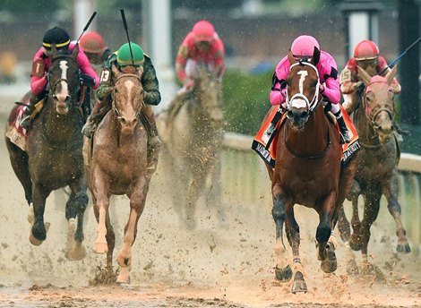 Maximum Security (pink cap) Luis Saez up, crosses the finish line first, but was disqualified and placed 17th for interference...<br><br />
&#169; Rick Samuels/The Blood-Horse