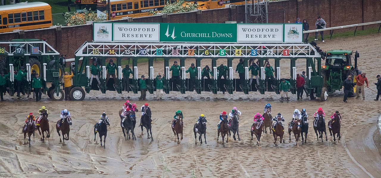 Horses running in the mud during the 2019 Kentucky Derby