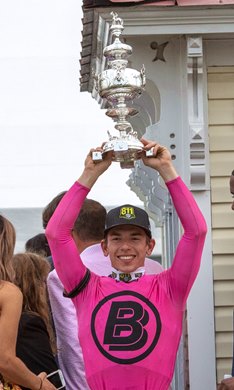 Jockey Tyler Gaffalione holds the winner’s trophy aloft after winning the 144th running of The Preakness Stakes on War of Will Saturday May 8th at Pimlico Race Course in Baltimore, MD.
