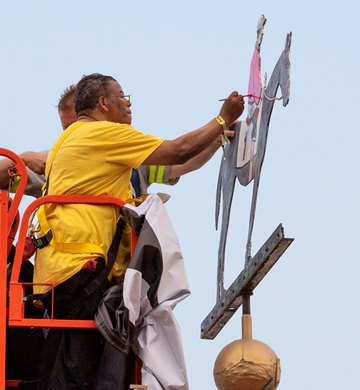 The silks of Gary Barber are painted on the weathervane on the cupola in the infield after War of Will won the 144th running of The Preakness Stakes Saturday May 8th at Pimlico Race Course in Baltimore, MD.  