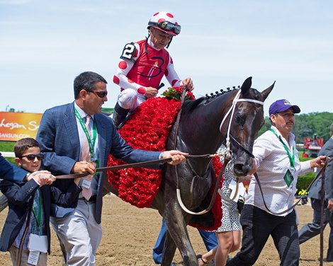 Owner Sol Kumin on left. Midnight Bisou with Mike Smith wins the Ogden Phipps (G1) at Belmont on June 8, 2019 in Elmont,  NY. 