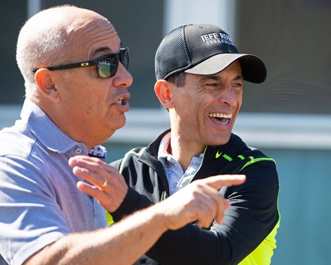 In a light moment between jockey John Velazquez, right, and trainer Mark Casse<br>
Mornings at Belmont Park June 4, 2019 in Elmont,  NY.