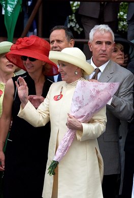 Marylou Whitney waves in the winners circle with trainer Nick Zito (right) and his wife Kim (left, red hat) and Belmont chairman Barry Schwartz.<br><br />
Birdstone wins the Belmont Stakes, breeder/owner Marylou Whitney Stables and trainer Nick Zito.<br><br />
Belmont Stakes day at Belmont Park near Elmont, New York on June 5, 2004. <br><br />
