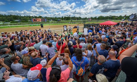 Mariano Rivera, center rear, speaks to the crowd just before the third race, &quot;The Mariano Rivera Hall of Fame&quot; which was part of the Spa&#39;s tribute to the retired New York Yankees pitcher at the Saratoga Race Course Friday July 12, 2019 in Saratoga Springs, N.Y. River and others will be Inducted during a ceremony scheduled for Sunday, July 21 at the Hall of Fame in Cooperstown, N.Y.  