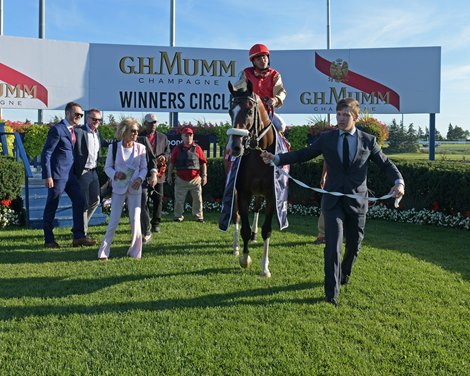 Owner Michael Balaz leading the winner in the winner’s circle. El Tormenta with Eurico Da Silva wins Ricoh Woodbine Mile (G1)<br><br />
at Woodbine.