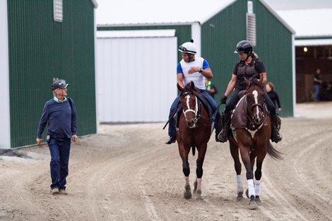 Trainer Jason Servis walks back to the barn with Maximum Security and exercise rider Alvaro Tomas after a morning workout at Parx Racing in Bensalem, PA on Friday morning September 6, 2019 after shipping down from Monmouth Park. 