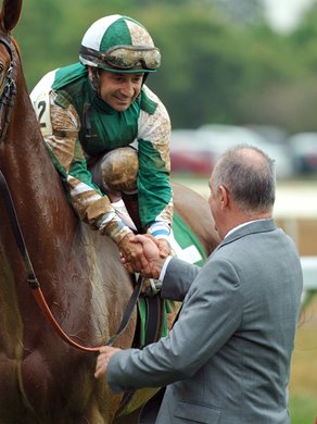 Jockey Joe Bravo congratulates trainer Ignacio Correas IV in the Keeneland winners&#39; circle, after guiding Blue Prize to her second consecutive win in the Gr.1 Spinster Stakes...&#169; Rick Samuels 2019