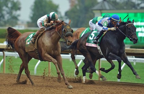 Blue Prize (2) Joe Bravo up, runs by Elate (5) and Dunbar Road, to win her second consecutive Gr.1 Spinster Stakes at Keeneland...<br><br />
&#169; Rick Samuels 2019