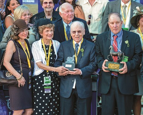 Caption: l-r-, Bonnie Fink Marcus (daughter), Mr. and Mrs. Morton (Elaine) Fink, and trainer Charlie Lopresti.  Wise Dan with John Velazquez wins the Mile.<br><br />
Breeders&#39; Cup races at Santa Anita near Arcadia, California, on Nov. 3, 2012.