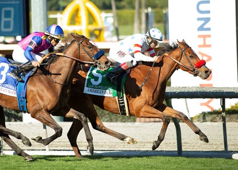 Lady Prancealot and Joe Bravo blow by Mucho Unusual and Joe Rosario to win the Grade I $300,000 American Oaks Saturday, Dec. 28, 2019 at Santa Anita Park, Arcadia, CA