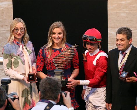 Belinda Stronach presents trophy to Jimmy Barnes, 2020 Pegasus World Cup