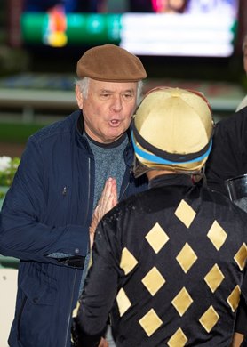 Owner Bo Hirsch talks with jockey Victor Espinoza after Ce Ce&#39;s victory in the Beholder Mile at Santa Anita Park