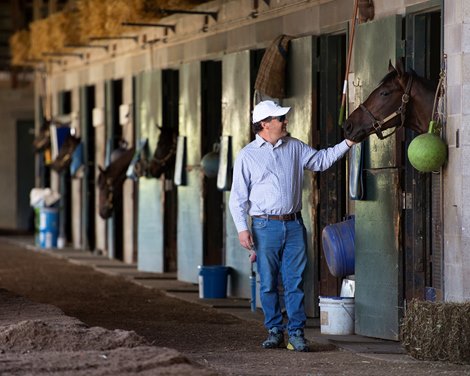 Ben Colebrook in shedrow and with horse named Scale<br><br />
Behind the Scenes at Keeneland during Covid19 virus and the people, horses, and essentials needed to take care of race horses on April 2, 2020 Keeneland in Lexington, KY. 