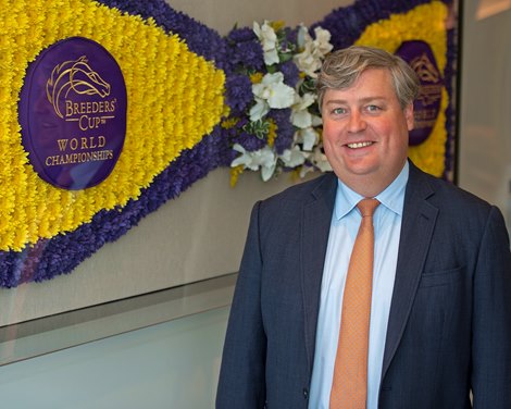 Caption: by blanket of flowers, reflection<br><br />
Breeders’ Cup CEO and President Drew Fleming in the Breeders’ Cup office in downtown Lexington, Ky., on June 16, 2020 Drew Fleming in Lexington, KY. 