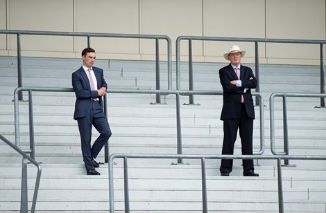John Gosden (R) and his assistant Thady Gosden watch Lord North win the Group 1 Prince Of Wales’s Stakes<br><br />
Ascot 17.6.20