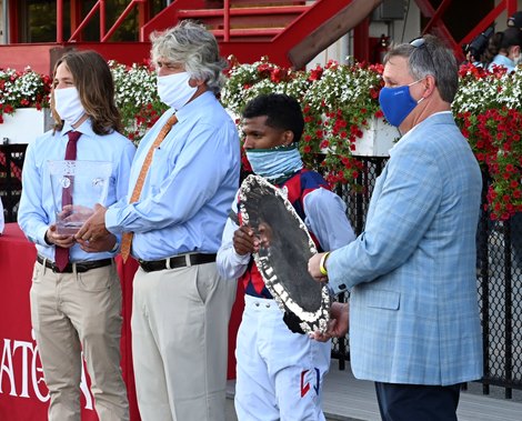 In the winner’s circle is Darren Asmussen, Steve Asmussen jockey Recardo Santana Jr. and representing Three Chimney’s farm is Doug Cauthen after Volatile trained by Steve Asmussen won the 36th running of the The Alfred G. Vanderbilt at Saratoga Race Course Saturday July 25, 2020 in Saratoga Springs, N.Y.  Photo by Skip Dickstein