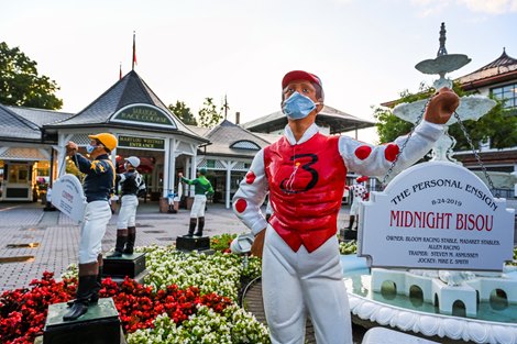 Even the lawn jockeys wear their masks are maintain social distancing outside the Clubhouse the day before opening day at Saratoga Race Course July 15, 2020 in Saratoga Springs, N.Y.  Photo by Skip Dickstein