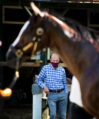 Tiz the Law’s trainer Barclay Tagg keeps  close eye on his charge while he is bathed Saturday July 25, 2020 at the Saratoga Race Course in Saratoga Springs, N.Y. 