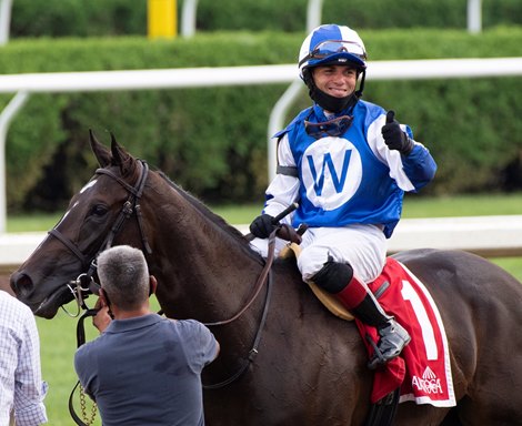 Jockey Joel Rosario gives the thumbs up signal after he rode RosarioSpeaktomeofsummer   to win the 37th running of the Lake Placid at Saratoga Race Course July 19, 2020 in Saratoga Springs, N.Y.  Photo by Skip Dickstein